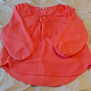 Bright orange blouse